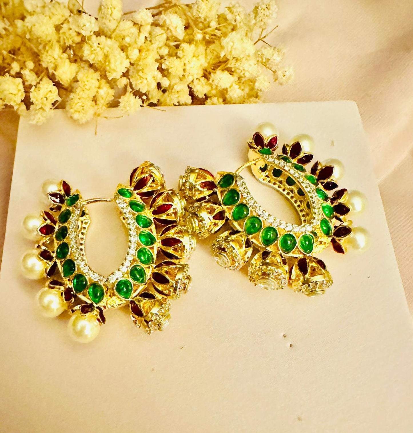 Emerald green Kundan baali earrings