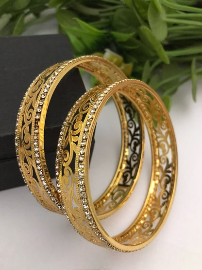 Gold finish ad bangles