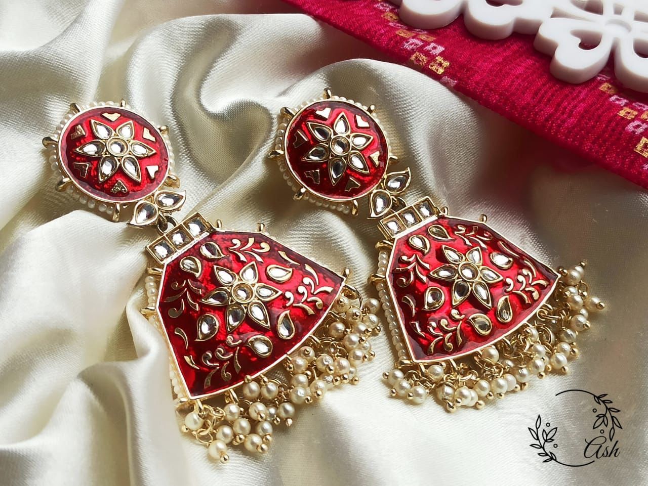 Red meenakari kundan earrings