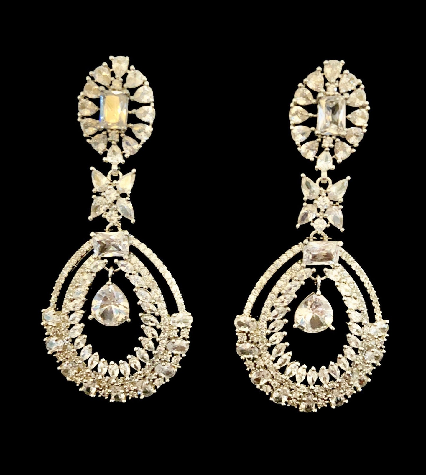 White diamente earrings